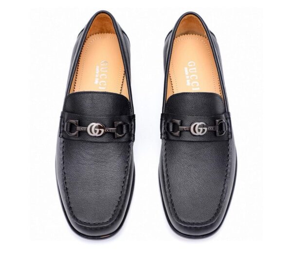 CHAUSSURES GUCCI AVEC MOTIF GUCCI